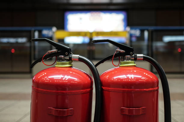 istock Close up on fire extinguisher in the city's Public transportation. Low angle. 1279485015
