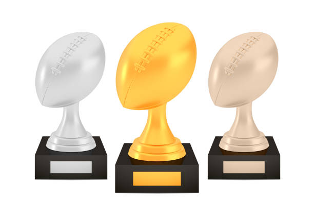 istock Winner american football awards set, gold silver bronze trophy cups on stands with empty plates 1279487666