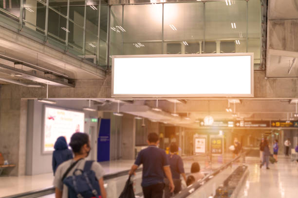 Blank indoor billboard at the arrival hall,airport. stock photo