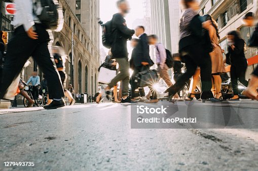 istock Crowded street in downtown at rush hour 1279493735