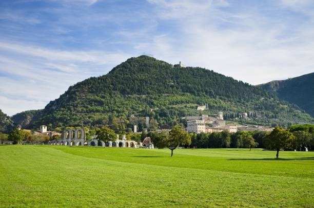 istock A panoramic view of Gubbio hills from a grassfield (Gubbio, Umbria, Italy) 1279496136