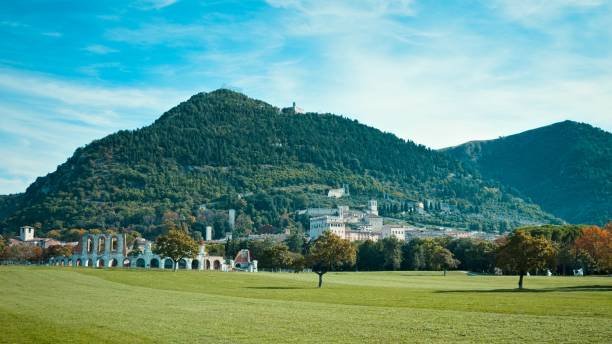 A panoramic view of Gubbio hills from a grassfield (Gubbio, Umbria, Italy)