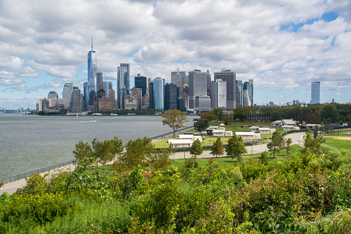 An aerial view of Governor's Island Greenery and Manhattan from an outlook point