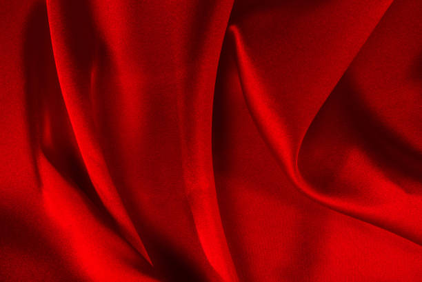 istock Red silk or satin luxury fabric texture can use as abstract background. Top view. 1279497624