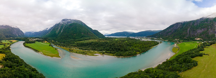 Wonderful aerial drone view of Rauma river, mountains and Andalsnes city