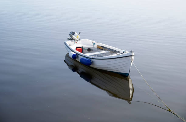 istock Boat in sea water for tranquility calm peace and mindfulness 1279500914