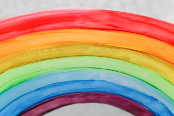 istock Rainbow on a window. Flash mob society community on self-isolation quarantine pandemic coronavirus. 1279501054