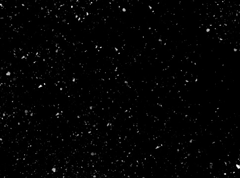Real snow on black background as texture