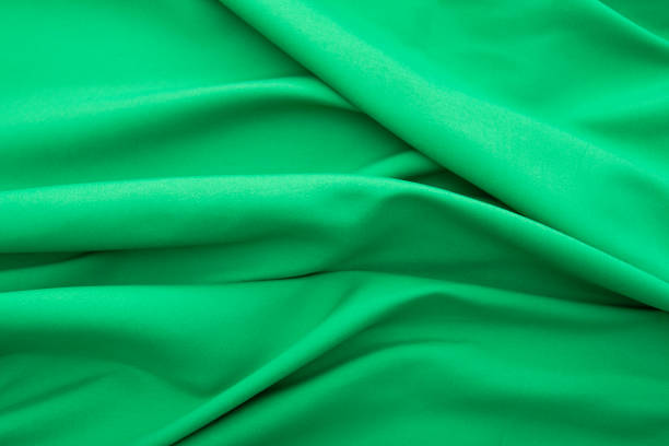 istock Wavy green fabric, cloth fabric texture or background, high resolution 1279502655