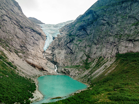 Briksdalsbreen is a glacier arm of Jostedalsbreen, and a lake, Briksdalsbre, Norway