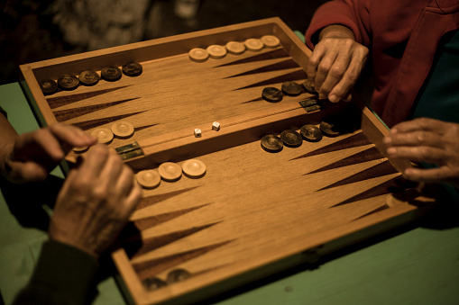 View of a backgammon game session at night.