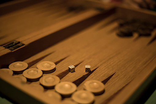 View of a backgammon game session at night.