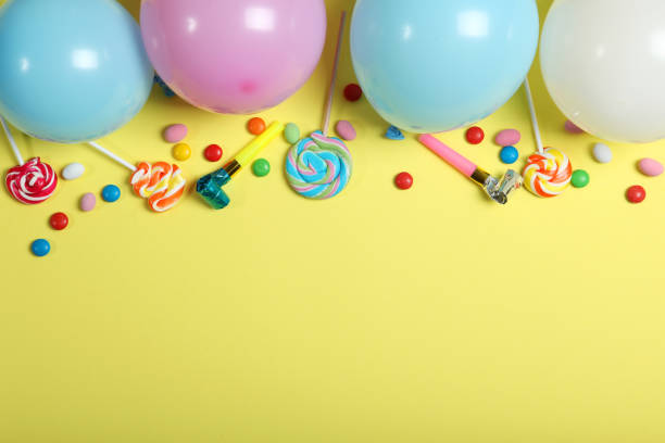 istock Flatlay composition with accessories for a party or birthday on a colored background with place for text top view. 1279509554