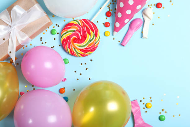 istock Flatlay composition with accessories for a party or birthday on a colored background with place for text top view. 1279509564