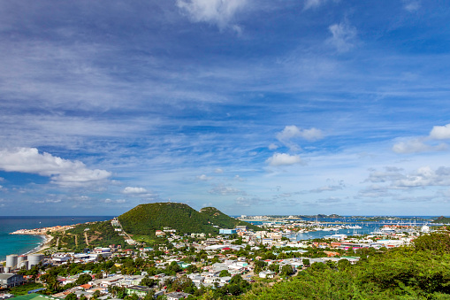 View from a hilltop of St Maartin, Netherlands Antilles with a view of the City, and Marina below and the Airport (SXM) in the distance