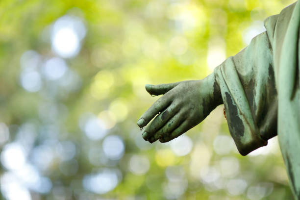 istock Hand of a copper Jesus sculpture 1279515475