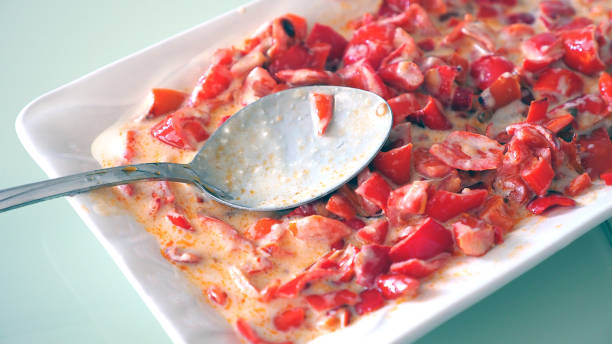istock fried red pepper with yoghurt, red pepper appetizer with yoghurt, 1279515498