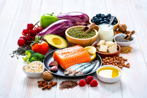 istock Foods to lower cholesterol shot on white table 1279519811