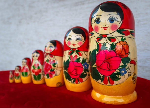 istock Russian nesting dolls, stacking dolls Isolated on white and red background 1279523967