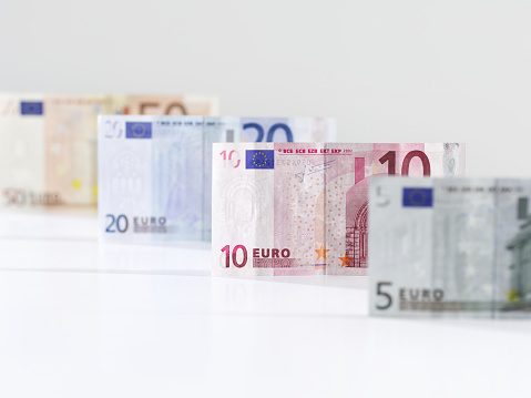 Euro banknotes on white background
