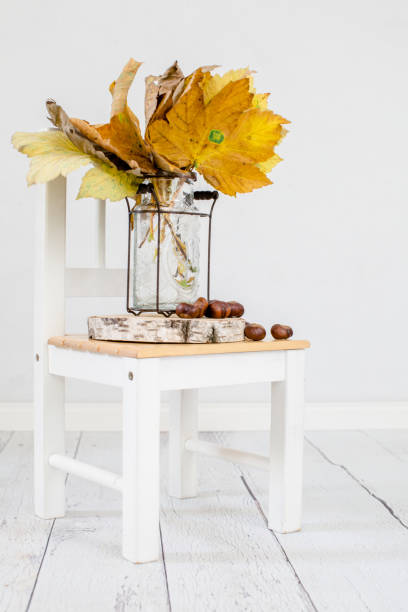 istock Autumn decorations with chestnut and maple leaves 1279528781