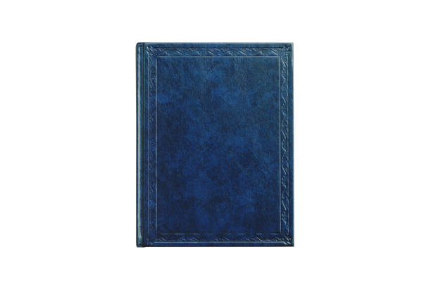 książka z okładką niebieski kolor izolowany na białym tle, widok z góry z bliska - leather cover zdjęcia i obrazy z banku zdjęć