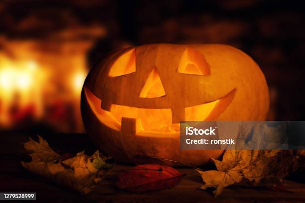 Halloween Pumpkin Spooky Glowing Jackolantern At Night Stock Photo - Download Image Now