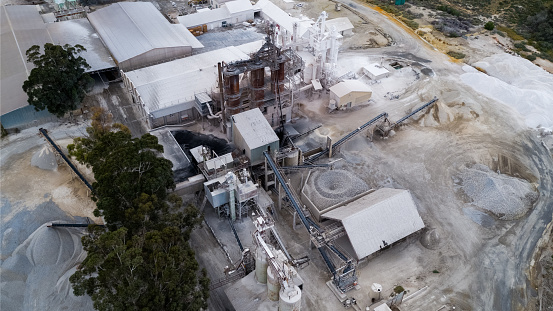 An aerial view overlooking a concrete and stone factory.