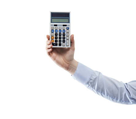 Businessman holding a retro type Calculator.