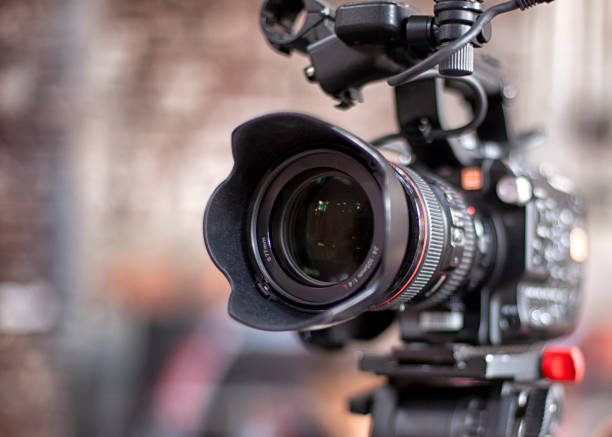 istock digital television camera filming a symphony orchestra. 1279532654