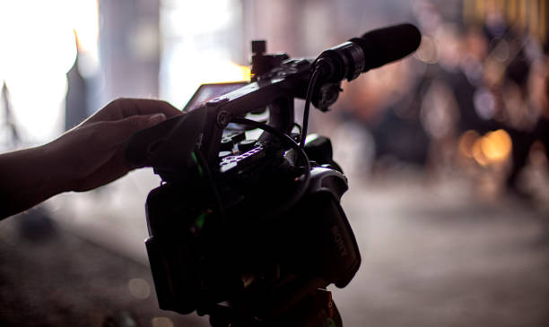 istock digital television camera filming a symphony orchestra. 1279532666