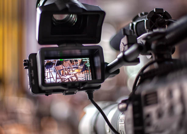 istock digital television camera filming a symphony orchestra. 1279532710