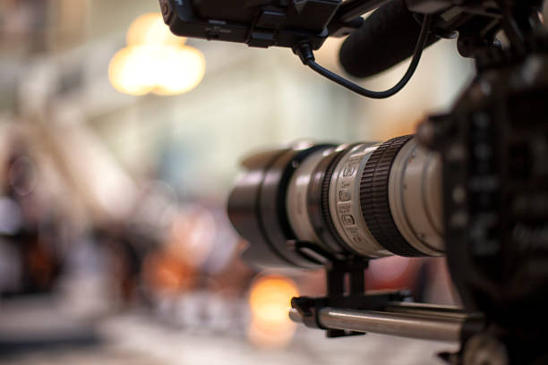 istock digital television camera filming a symphony orchestra. 1279532765