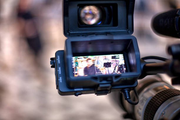 istock digital television camera filming a symphony orchestra. 1279532772
