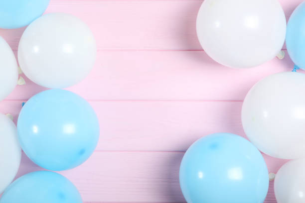 istock balloons in color top view. Festive background with place for text. 1279534643