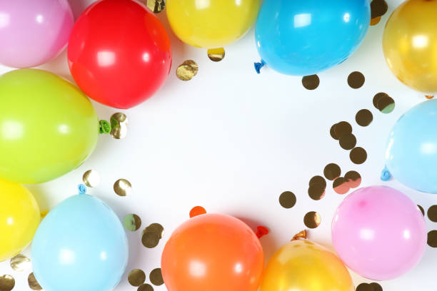 istock balloons in color top view. Festive background with place for text. 1279534647