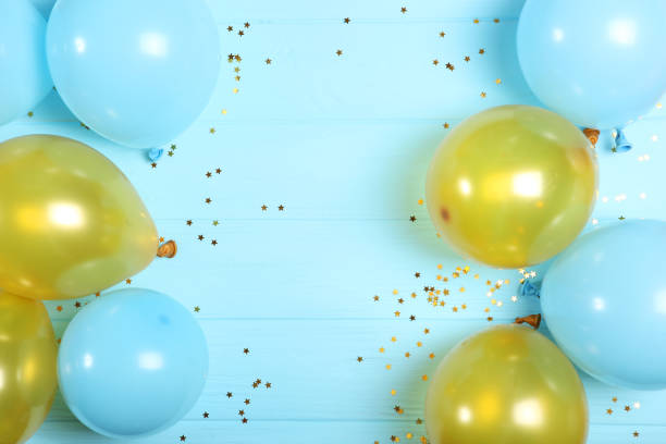 istock balloons in color top view. Festive background with place for text. 1279534748