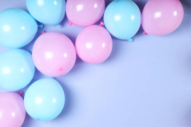 istock balloons in color top view. Festive background with place for text. 1279534749
