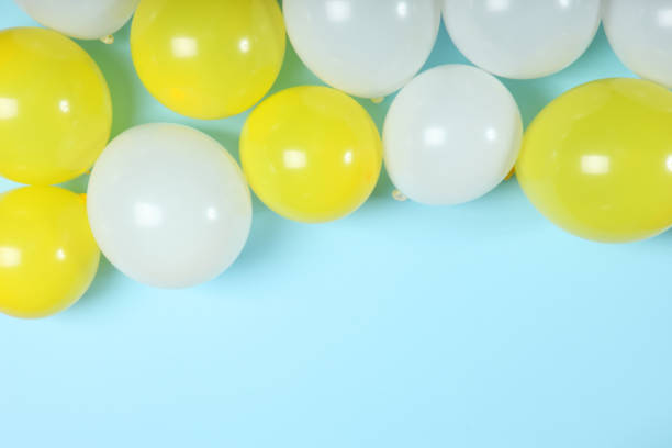 istock balloons in color top view. Festive background with place for text. 1279534763
