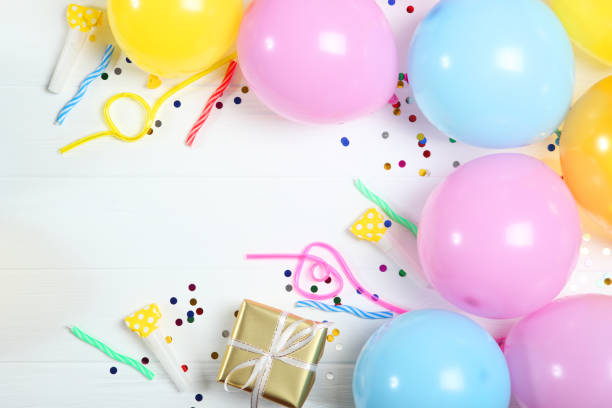 istock balloons in color top view. Festive background with place for text. 1279534814