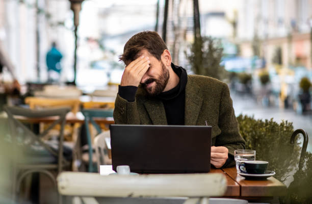 istock Young man working on his laptop 1279539481