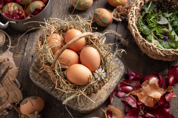 istock Easter eggs in a basket, ready to be dyed with onion peels 1279541228
