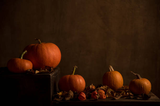 istock Pumpkin fall home decoration in dark tone 1279542332