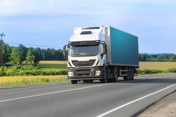 istock truck moves on highway 1279543310