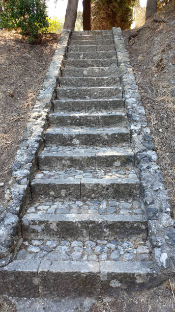 istock A long ancient stairs from briks and stones. Greece 1279545877