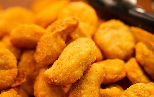 Full frame close up of delicious fried chicken nuggets