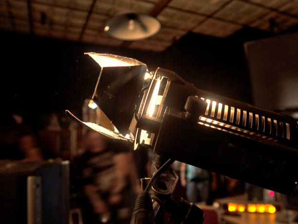 istock A lighting device on a tripod with fluorescent lamps and a thin filter fixed with clothespins are used movie shooting 1279547017