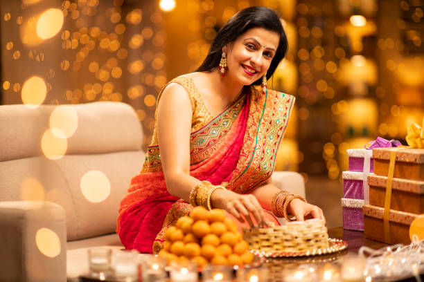 Woman Diwali Celebrate At Home - Stock Photo Indian, Indian culture, Indian ethnicity, Diwali, Festival, india sweets stock pictures, royalty-free photos & images