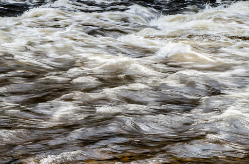 Water flowing from river during day