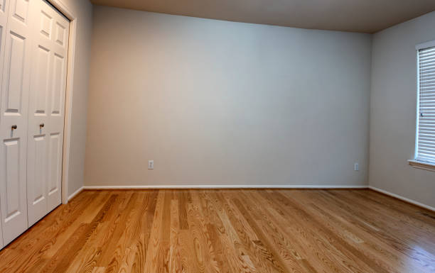 istock Newly installed red oak floor for bedroom in home 1279555896